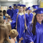 Seniors walking through elementary